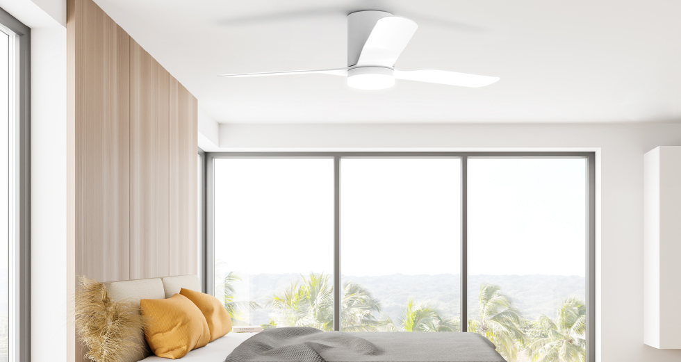 Sunny bedroom with white ceiling fan